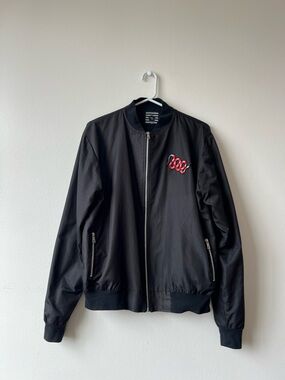 Black Bomber Jacket with Red Snake Logo Detail